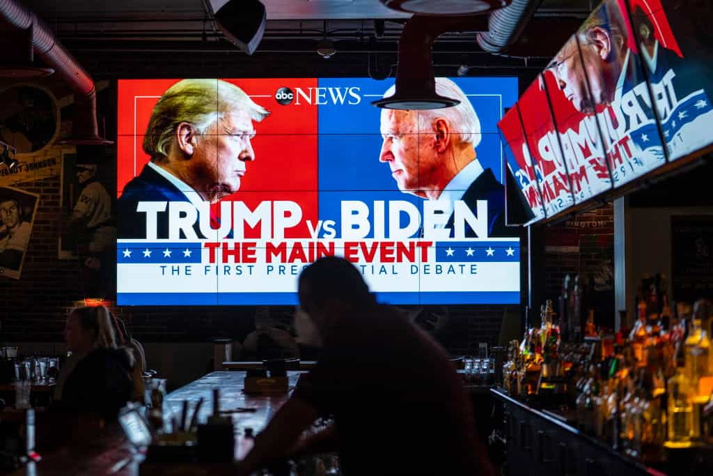 Television screens airing the first 2020 Presidential debate are seen at Walters Sports Bar in Washington.